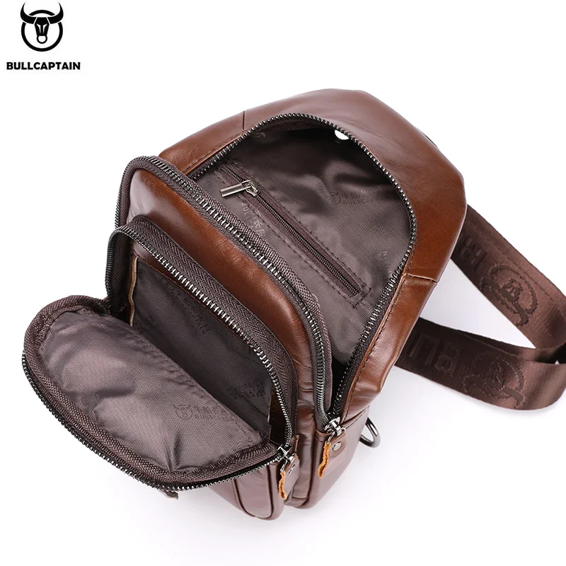 Multi-pocket organization system in a leather messenger bag showing compartmentalization techniques