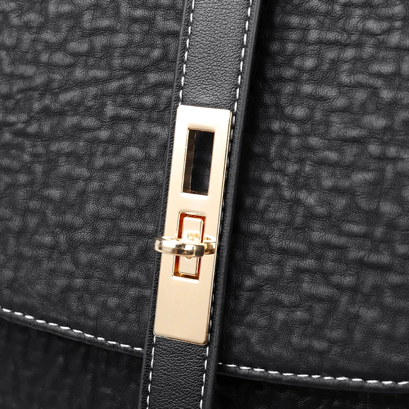 Multi-compartment leather backpack showing organized storage for academic or professional use