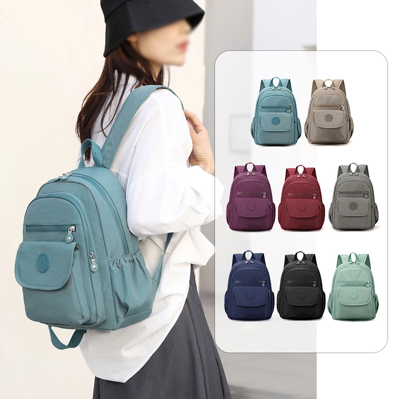 Lightweight Black Nylon Women's Travel Backpack with Zipper Compartments for Commuting and School - Image 2