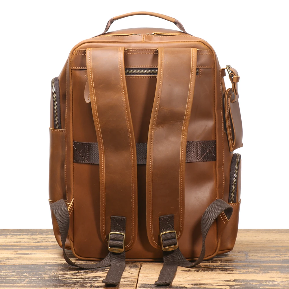 Luxury travel leather backpack with concealed security compartments