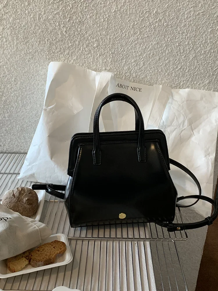 Vintage Black PU Leather Student Backpack with Retro Clip Closure for Women