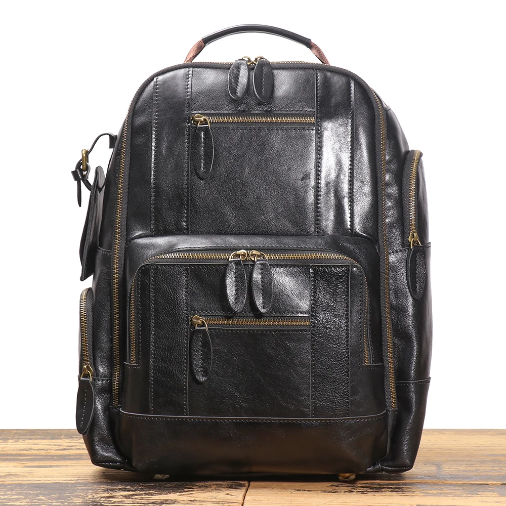 Premium full grain leather backpack with padded laptop compartment and organizational features